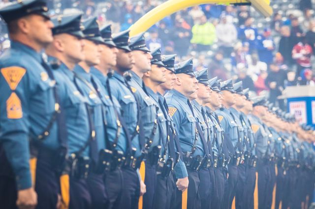 New Jersey police officers standing at attention.